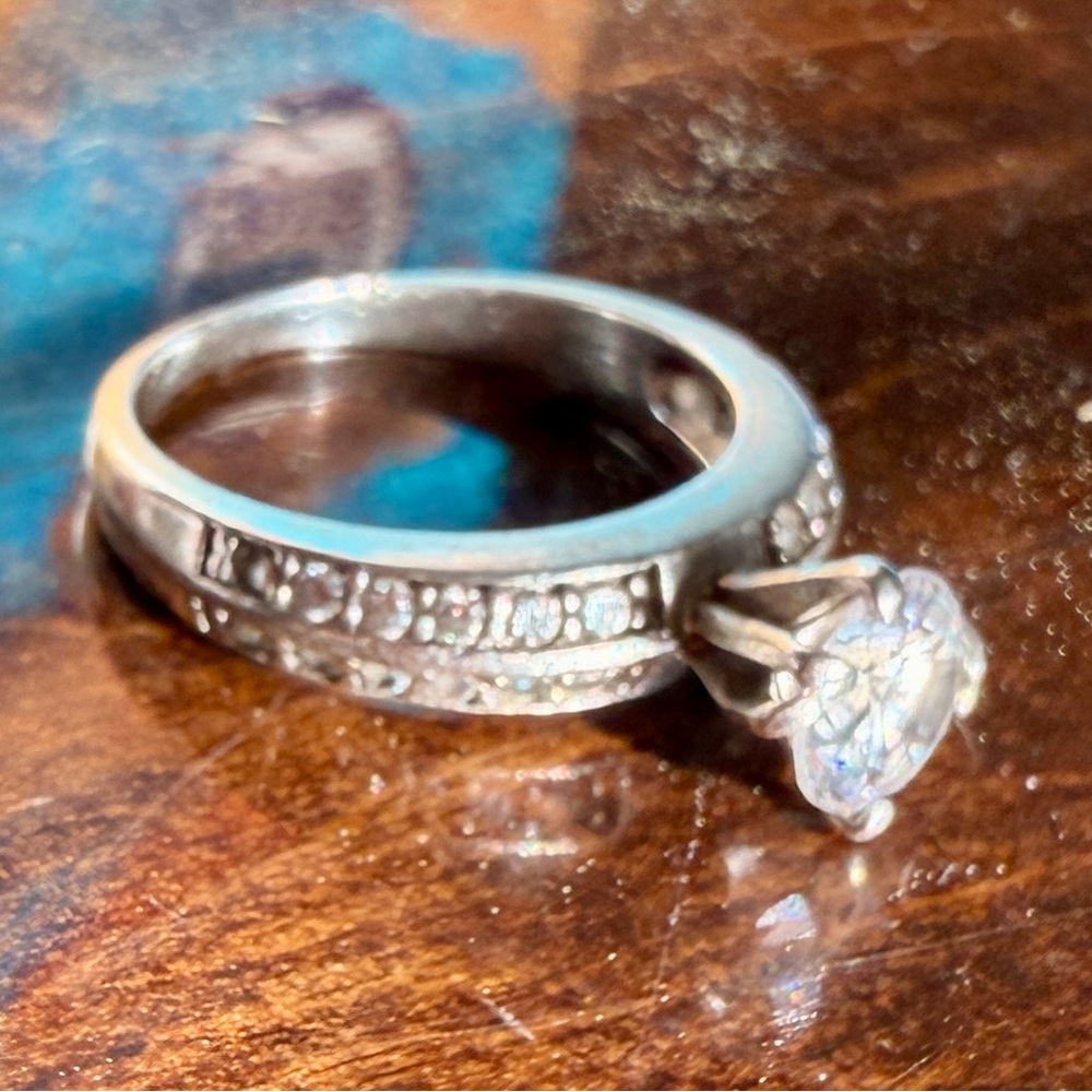 Silver Solitaire Engagement Ring with Pavé Band
